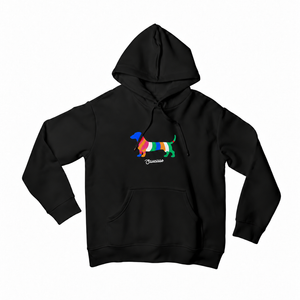 Front view of the Black Saucisse Colour Me Dachshund unisex hoodie, with a compact colourful striped dachshund print and white Saucisse signature.