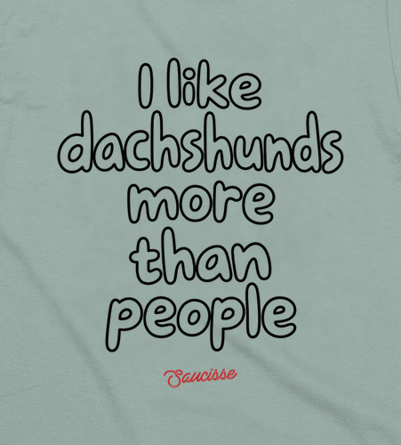 Close-up of the rear print on the Aloe Saucisse I Like Dachshunds More Than People T-shirt, showing the original outline lettering and red signature.