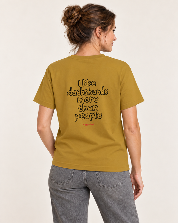 Rear studio view of the Ochre Saucisse I Like Dachshunds More Than People unisex T-shirt, with centred outline artwork raised slightly towards the shoulders.