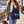 Woman carrying a French Navy Colour Me Dachshund tote on a seaside walk with a dachshund.