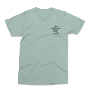 Aloe Saucisse I Like Dachshunds More Than People unisex T-shirt, front view with a small left-chest outline print and red Saucisse signature.
