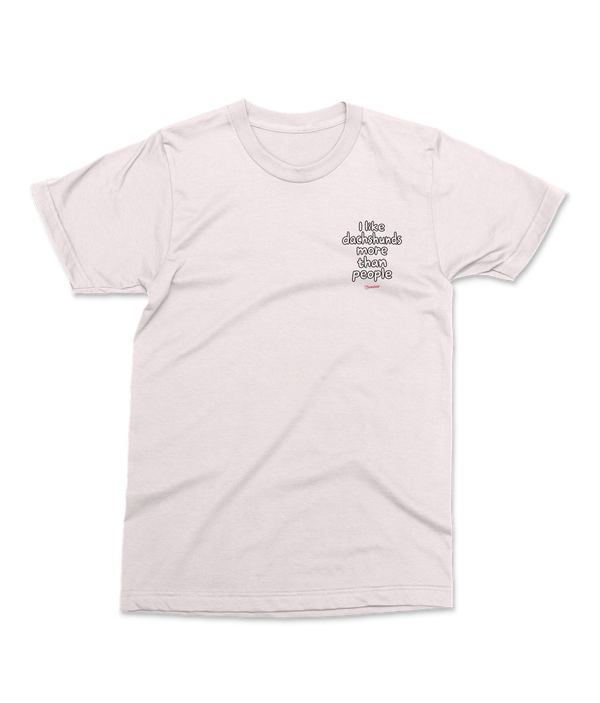 Vintage White Saucisse I Like Dachshunds More Than People unisex T-shirt, front view with a small left-chest outline print and red Saucisse signature.