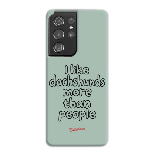 Saucisse sage-green phone case for Galaxy S21 Ultra, with “I like dachshunds more than people” lettering and a red signature.