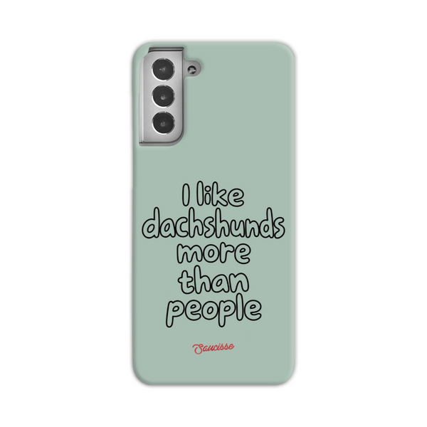 Saucisse sage-green phone case for Galaxy S24 Plus, with “I like dachshunds more than people” lettering and a red signature.