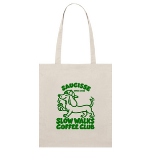Natural Raw Saucisse small tote bag with green dachshund artwork and Slow Walks Coffee Club lettering and long carry handles.