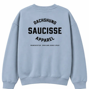 Back of Saucisse Manchester England unisex sweater in Aquamarine, with centred black Dachshund Apparel print