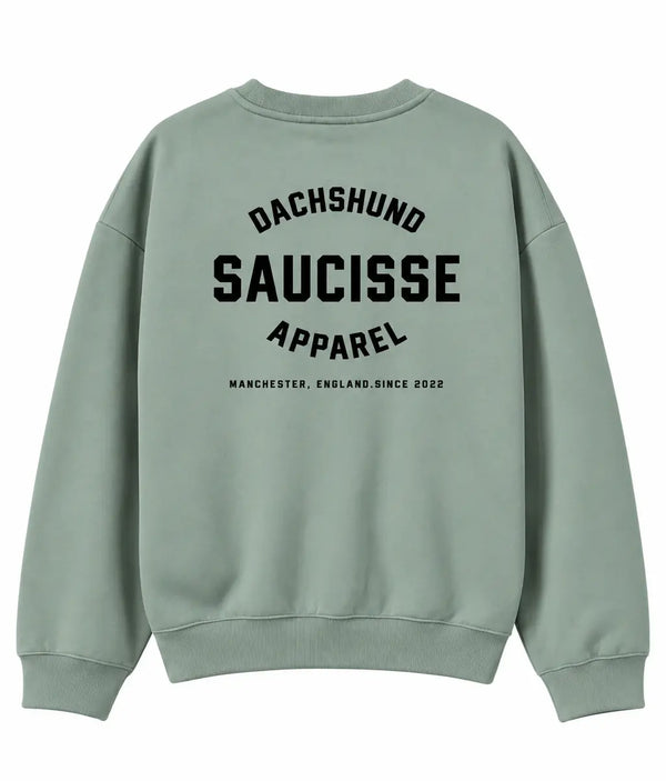 Back of Saucisse Manchester England unisex sweater in Jade Green, with centred black Dachshund Apparel print