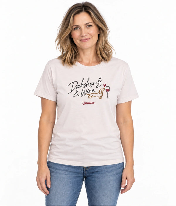 Woman wearing the Saucisse Dachshunds & Wine T-shirt in Vintage White with jeans