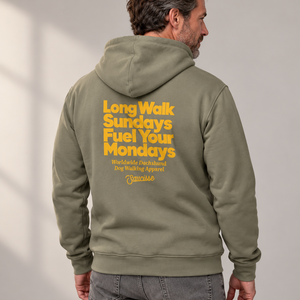 Man wearing the Saucisse Long Walk Sundays, Fuel Your Mondays hoodie in Almond Green, shown from the back in a studio.
