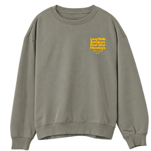 Saucisse Long Walk Sundays unisex sweater in Almond Green, front view with a small yellow left-chest print