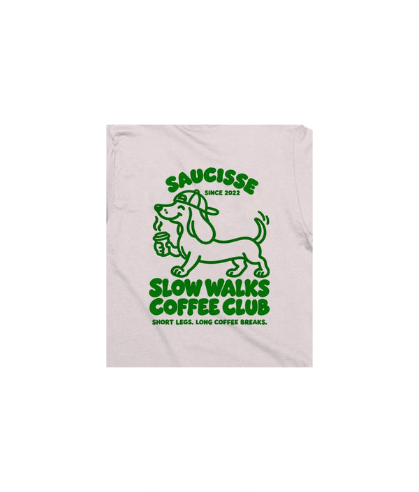 Close-up of the green Slow Walks Coffee Club back print on the Vintage White Saucisse T-shirt, showing the fabric texture