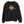 Saucisse Unzipped long-haired unisex sweater in Black, front view showing a long-haired dachshund in a green cap and sunglasses emerging from a printed zip.