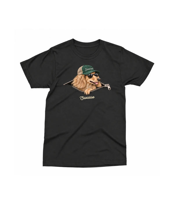 Saucisse Unzipped long-haired unisex T-shirt in Black, front view showing a long-haired dachshund in a green cap and sunglasses emerging from a printed zip.