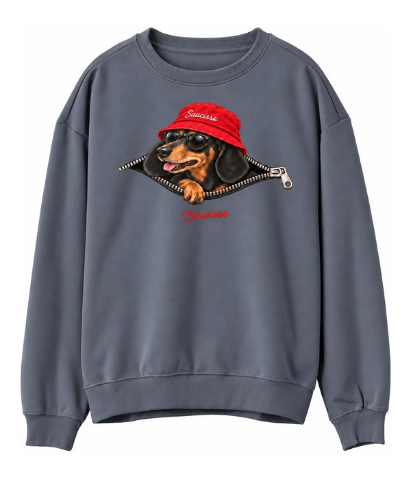 Front view of the Mineral Grey Saucisse Unzipped Short Haired unisex sweater, with a dachshund in a red Saucisse bucket hat and sunglasses peeping through an illustrated zip and a red Saucisse signature.
