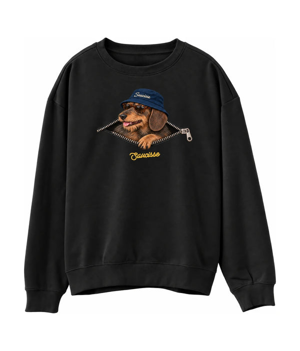 Front of the Saucisse Unzipped wire-haired unisex sweater in Black, with a navy-hat dachshund, printed silver zip and gold Saucisse signature.