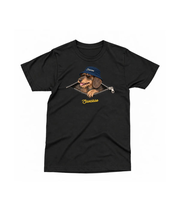 Front of the Saucisse Unzipped wire-haired unisex T-shirt in Black, with a navy-hat dachshund, printed silver zip and gold Saucisse signature.