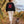 Saucisse Too Dachshund to Apologise black Sweatshirt, back lifestyle photograph with woman and dachshund.